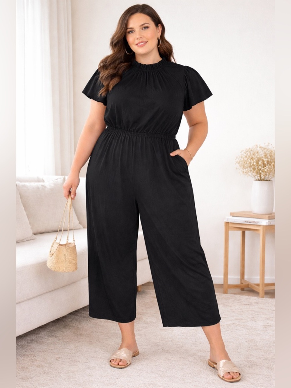 Women’s Black Short Sleeve Elastic Waist Jumpsuit. Zipper on back